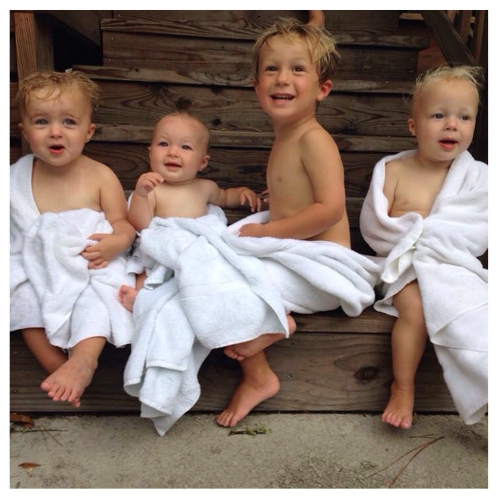 four grandchildren towels beach